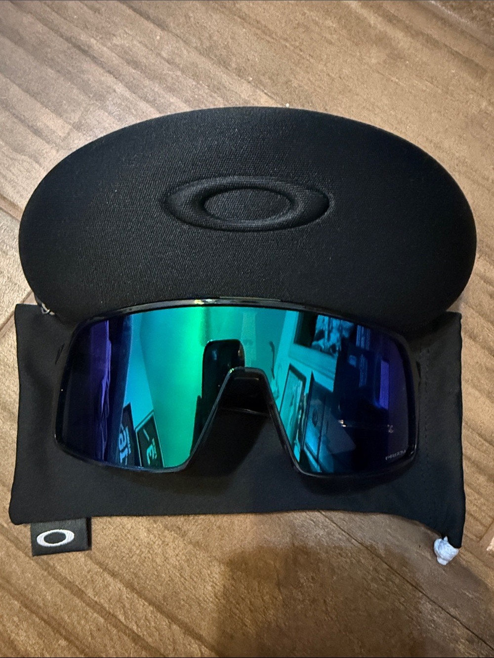 Oakley Shield Sunglasses with Blue-Green Mirrored Lens and Black Frame